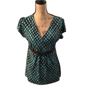 Retro style belted faux-wrap blouse.